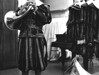 Royal Opera House Covent Garden 1973. Period costume (including hand-made pigskin shoes) for on-stage wind-band in Mozart’s “Don Giovanni.” We played from memory, while following Colin Davis conducting in the pit.